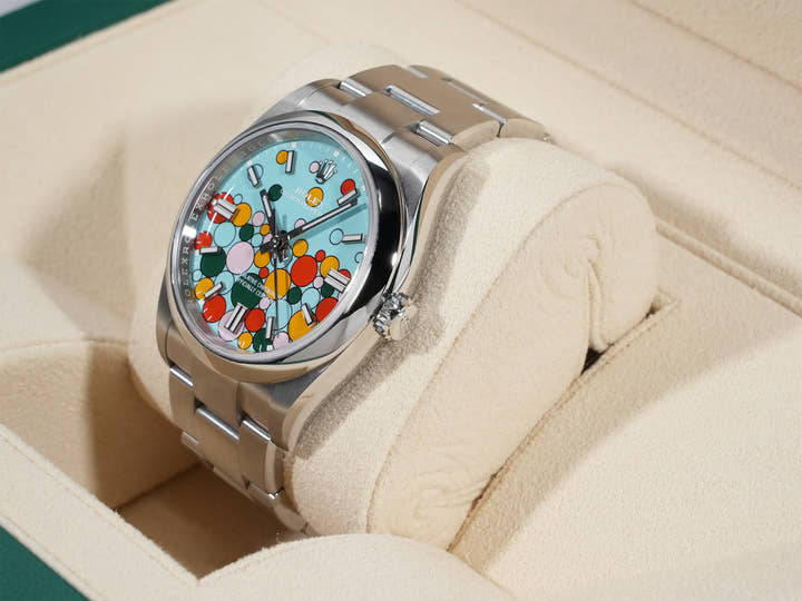 Rolex Oyster Perpetual 36 Ref. 126000 Stainless Steel with Celebration Motif Dial