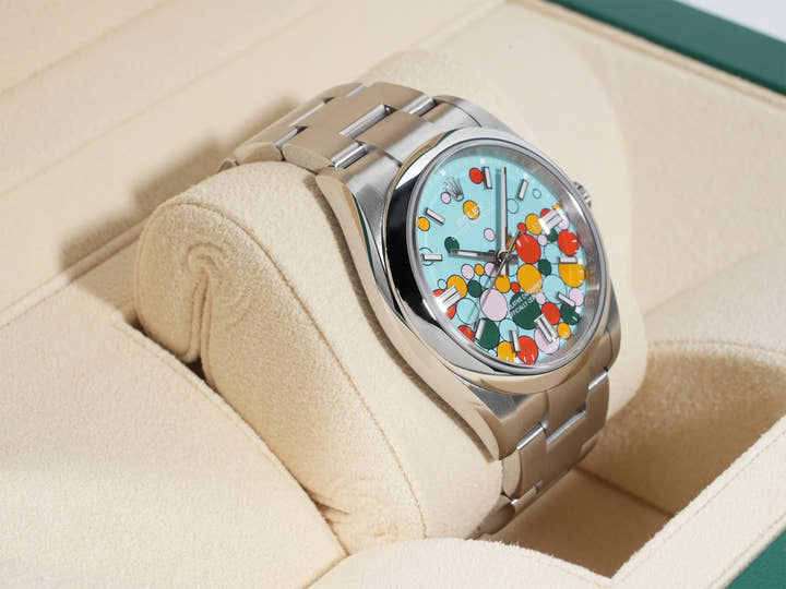 Rolex Oyster Perpetual 36 Ref. 126000 Stainless Steel with Celebration Motif Dial