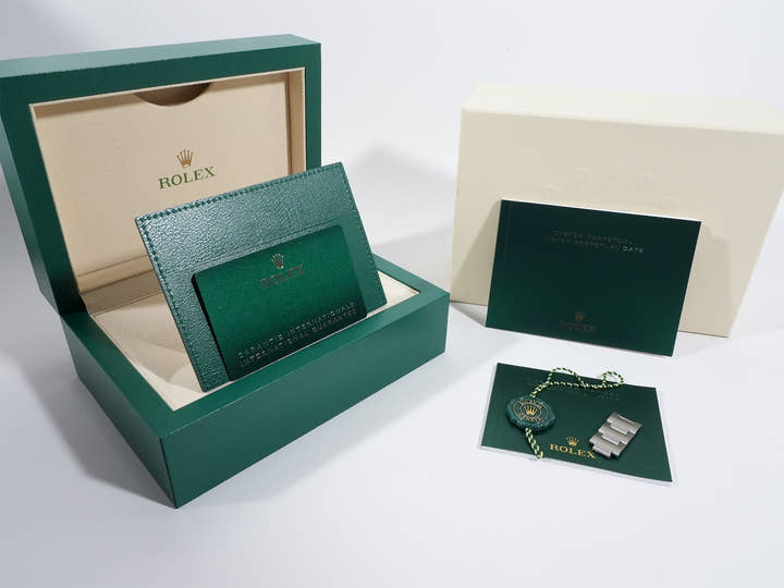 Rolex Oyster Perpetual 36 Ref. 126000 Stainless Steel with Celebration Motif Dial