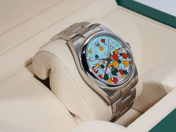 Rolex Oyster Perpetual 41 Ref. 124300 Stainless Steel with Celebration Motif Dial