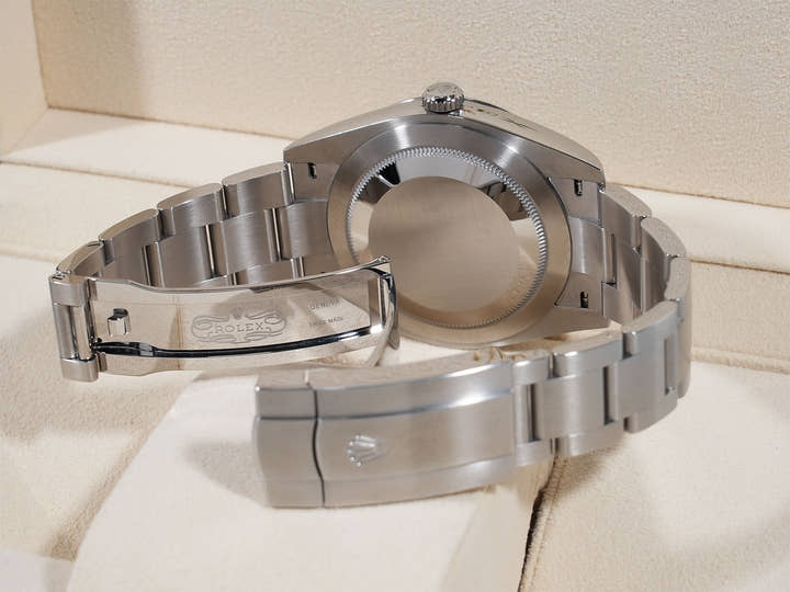 Rolex Oyster Perpetual 41 Ref. 124300 Stainless Steel with Celebration Motif Dial