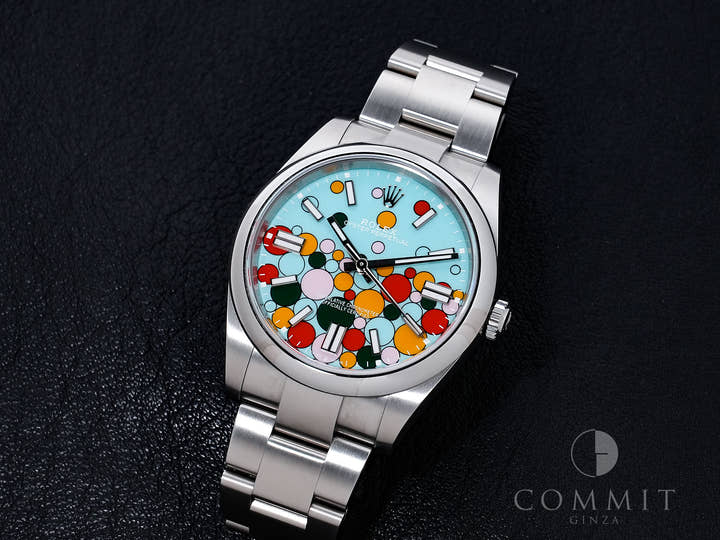 Rolex Oyster Perpetual 41 Ref. 124300 Stainless Steel with Celebration Motif Dial