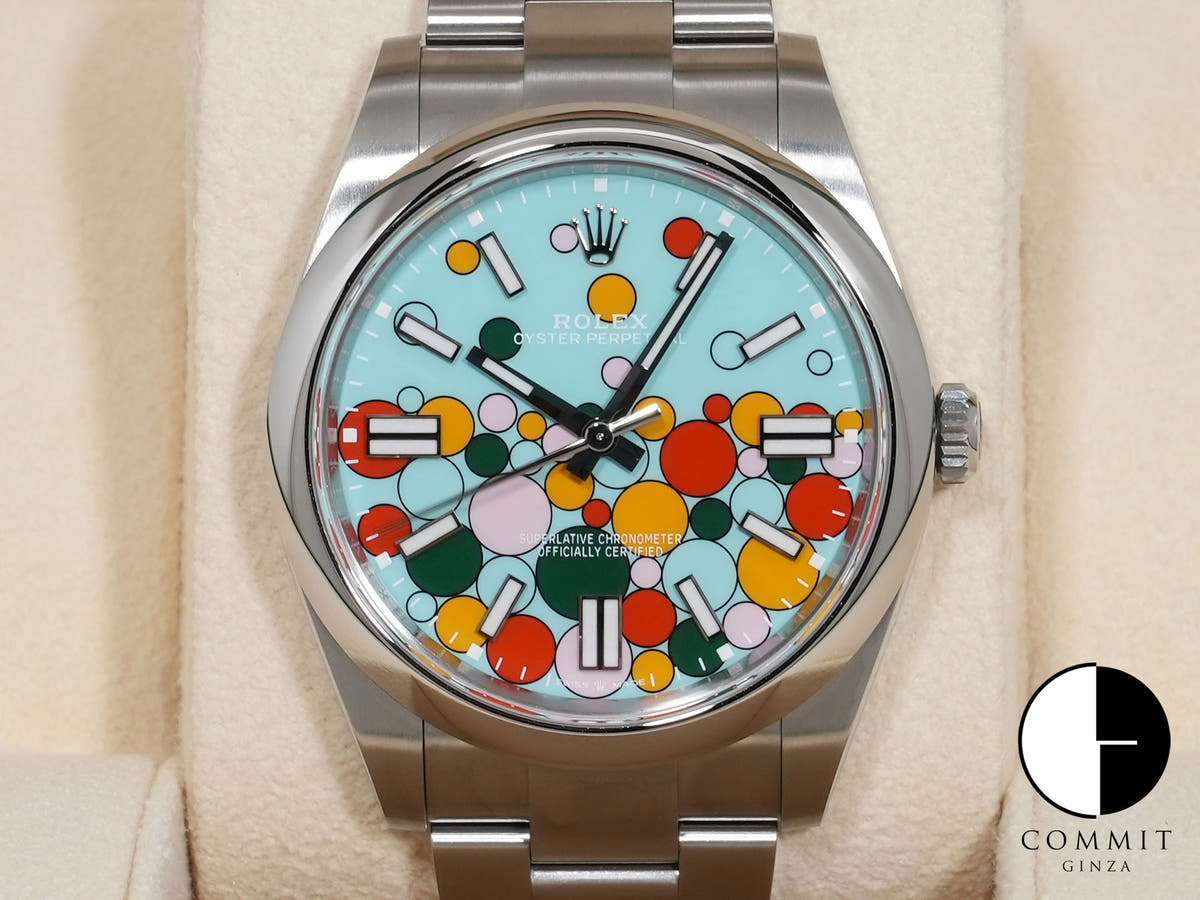 Rolex Oyster Perpetual 41 Ref. 124300 Stainless Steel with Celebration Motif Dial