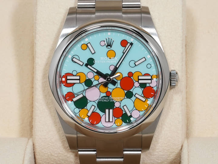 Rolex Oyster Perpetual 41 Ref. 124300 Stainless Steel with Celebration Motif Dial