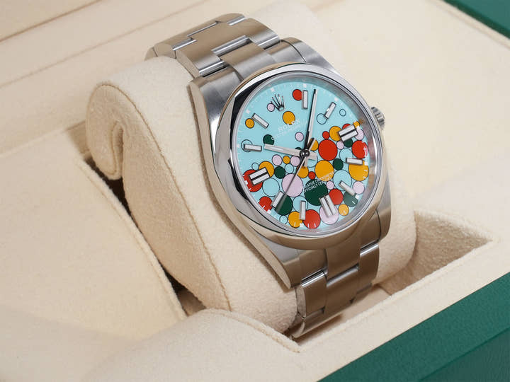 Rolex Oyster Perpetual 41 Ref. 124300 Stainless Steel with Celebration Motif Dial