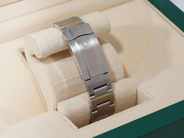 Rolex Oyster Perpetual 41 Ref. 124300 Stainless Steel with Celebration Motif Dial