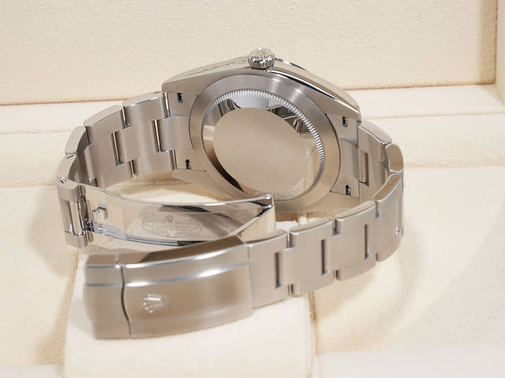 Rolex Oyster Perpetual 41 Ref. 124300 Stainless Steel with Celebration Motif Dial
