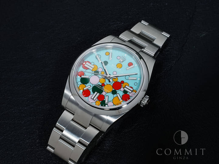 Rolex Oyster Perpetual 41 Ref. 124300 Stainless Steel with Celebration Motif Dial