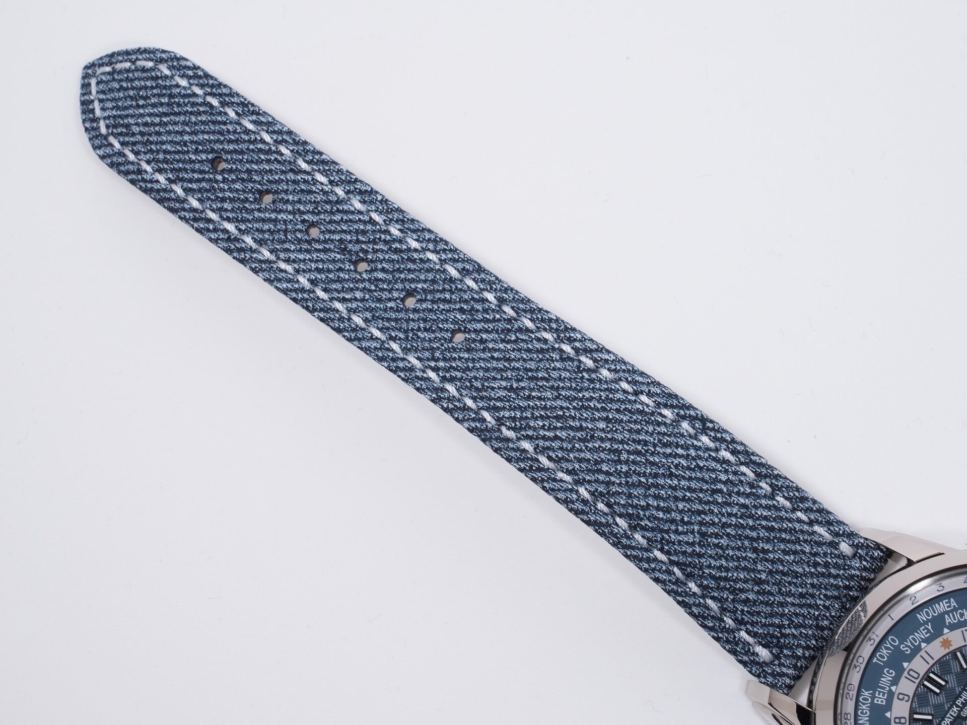 Patek Philippe Complication World Time Date Ref. 5330G-001 18KWG blue-grey opaline dial, unused.