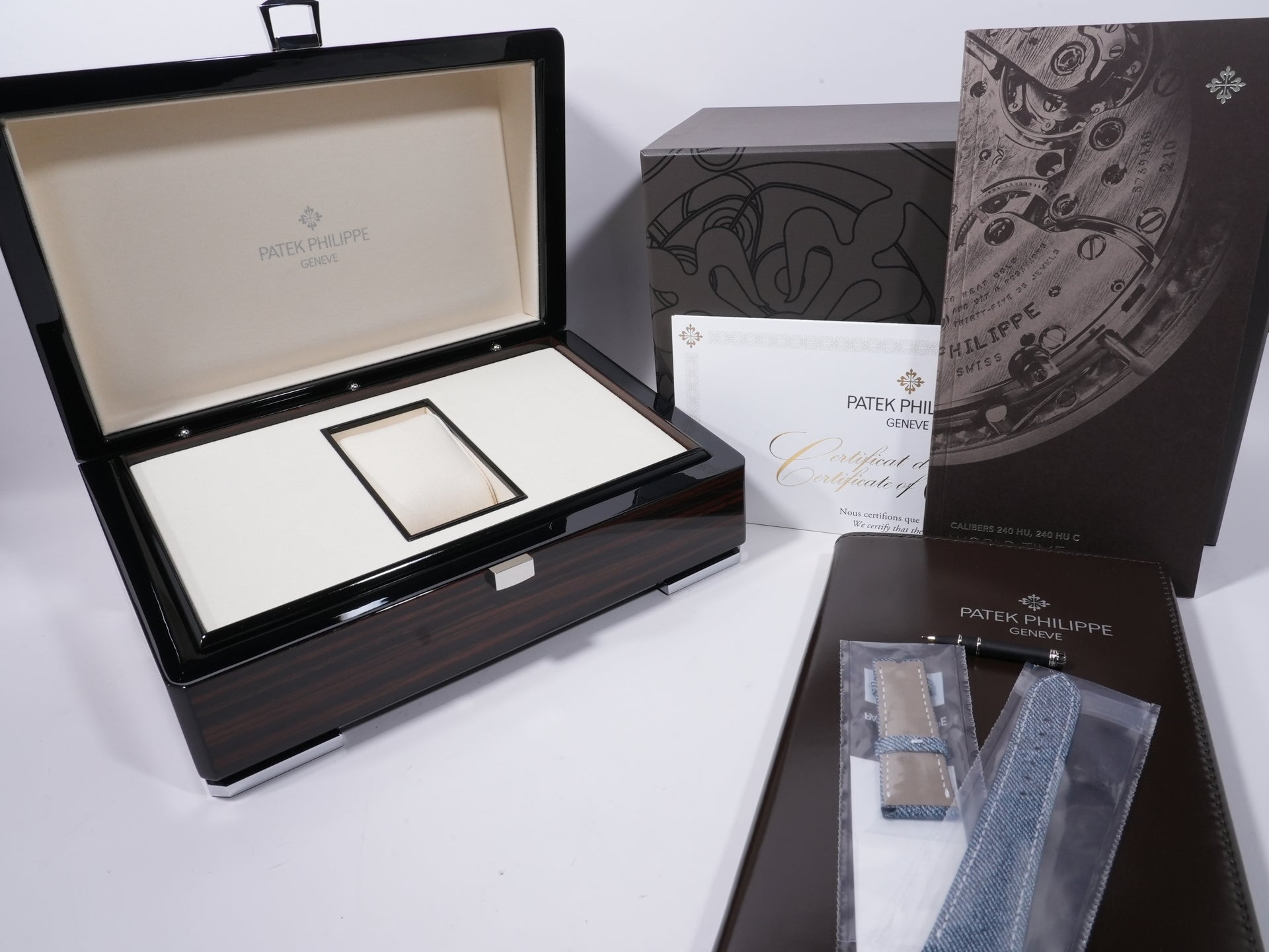 Patek Philippe Complication World Time Date Ref. 5330G-001 18KWG blue-grey opaline dial, unused.