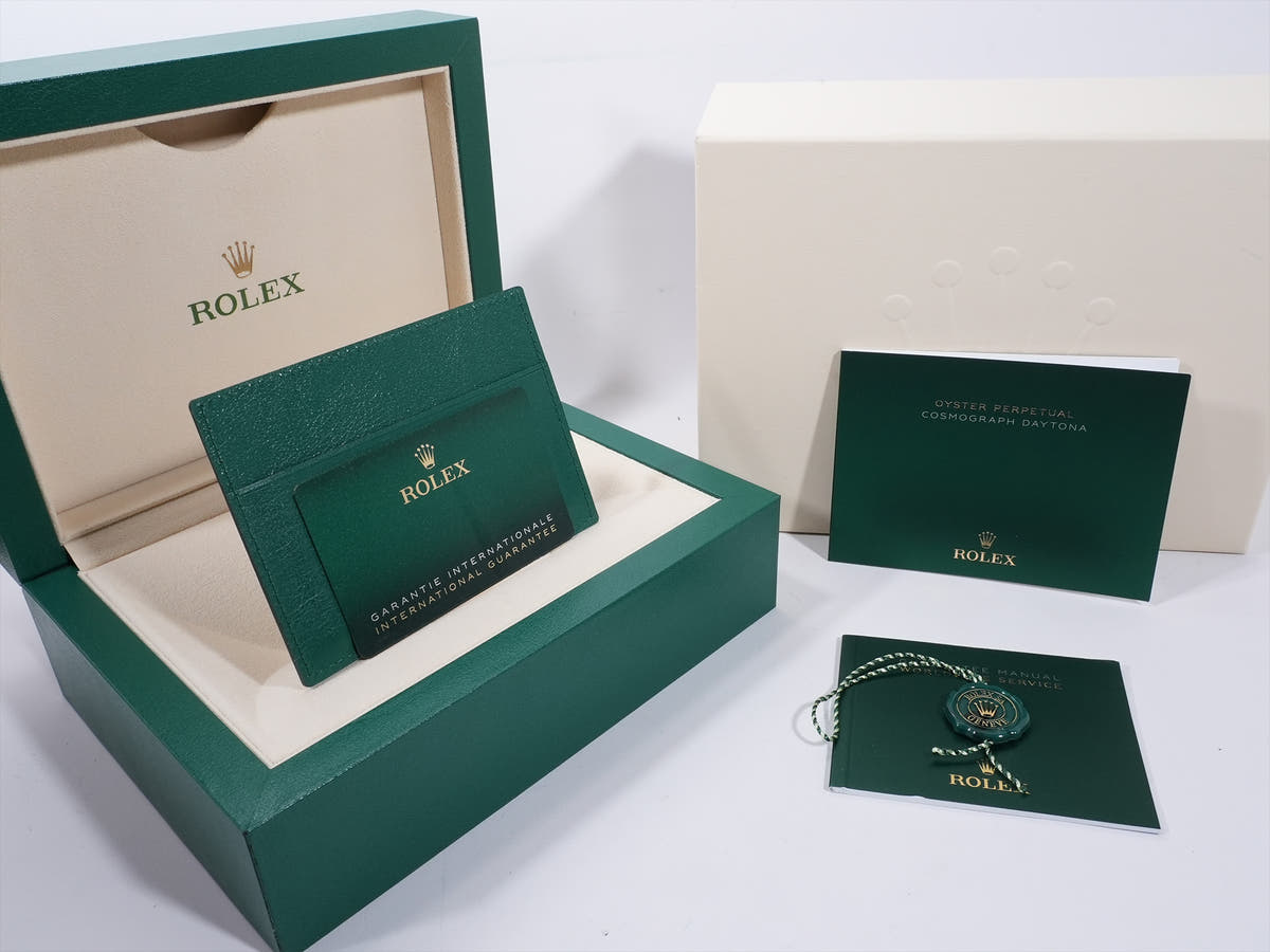 Rolex Daytona Ref. 126518LN 18KYG Turquoise Blue Dial, Unused.  (b7pa85qq appears to be an internal reference number and not part of the product description)