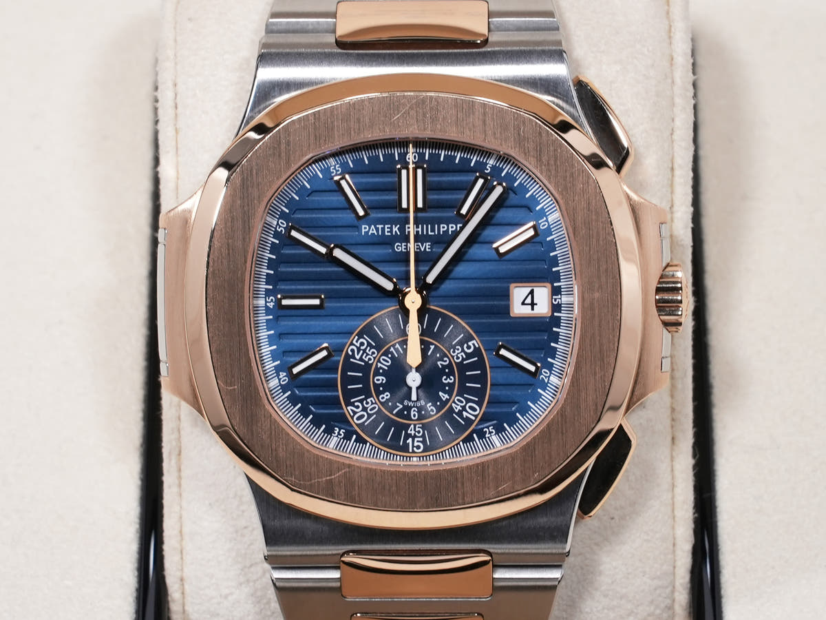 Patek Philippe Nautilus Chronograph Ref. 5980/1AR-001 SS/RG Blue Dial, Pre-owned, Excellent Condition  (67aqopet likely refers to an internal reference number or ID and is not translated)