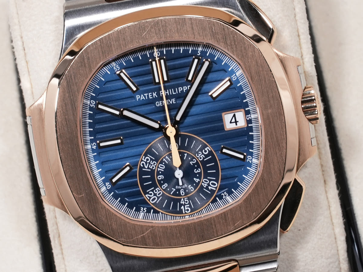 Patek Philippe Nautilus Chronograph Ref. 5980/1AR-001 SS/RG Blue Dial, Pre-owned, Excellent Condition  (67aqopet likely refers to an internal reference number or ID and is not translated)