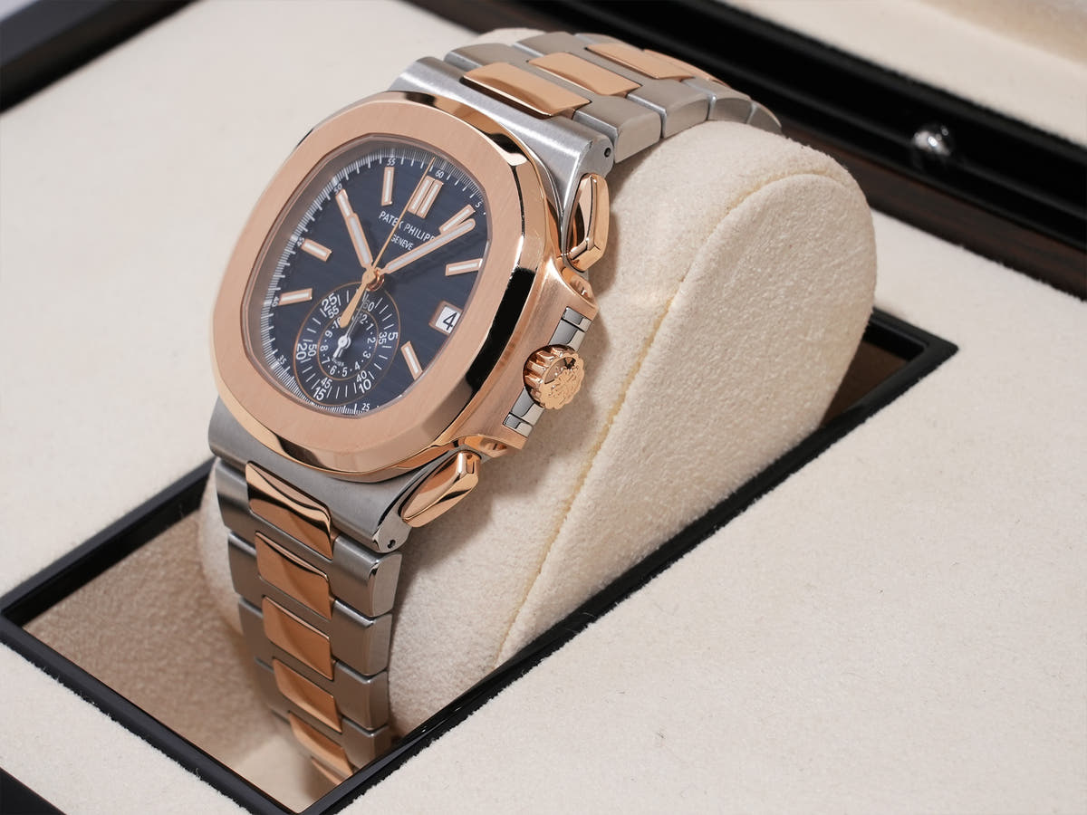 Patek Philippe Nautilus Chronograph Ref. 5980/1AR-001 SS/RG Blue Dial, Pre-owned, Excellent Condition  (67aqopet likely refers to an internal reference number or ID and is not translated)