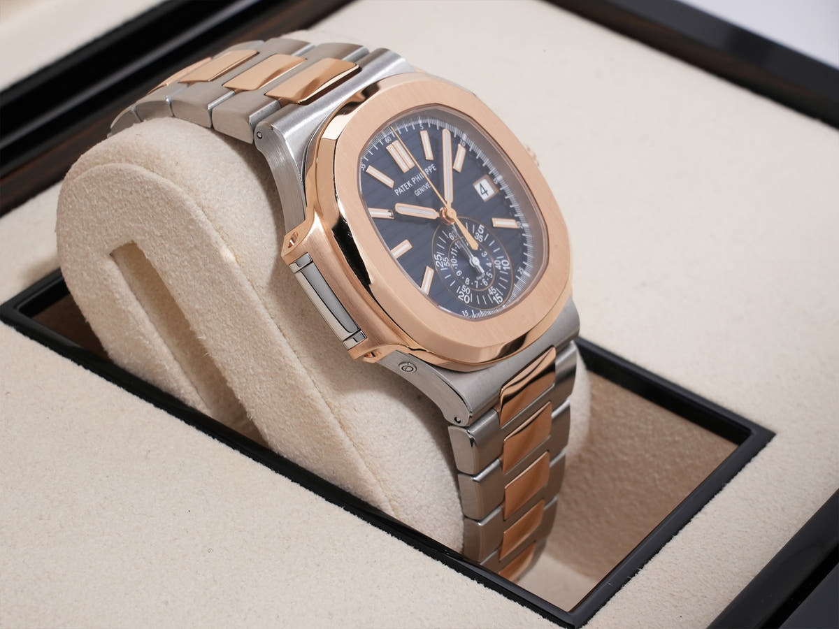 Patek Philippe Nautilus Chronograph Ref. 5980/1AR-001 SS/RG Blue Dial, Pre-owned, Excellent Condition  (67aqopet likely refers to an internal reference number or ID and is not translated)