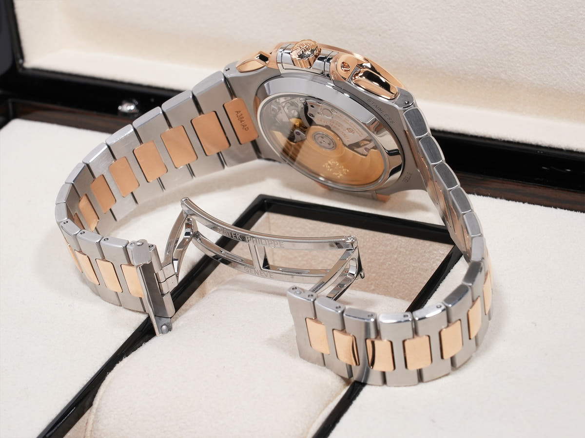 Patek Philippe Nautilus Chronograph Ref. 5980/1AR-001 SS/RG Blue Dial, Pre-owned, Excellent Condition  (67aqopet likely refers to an internal reference number or ID and is not translated)