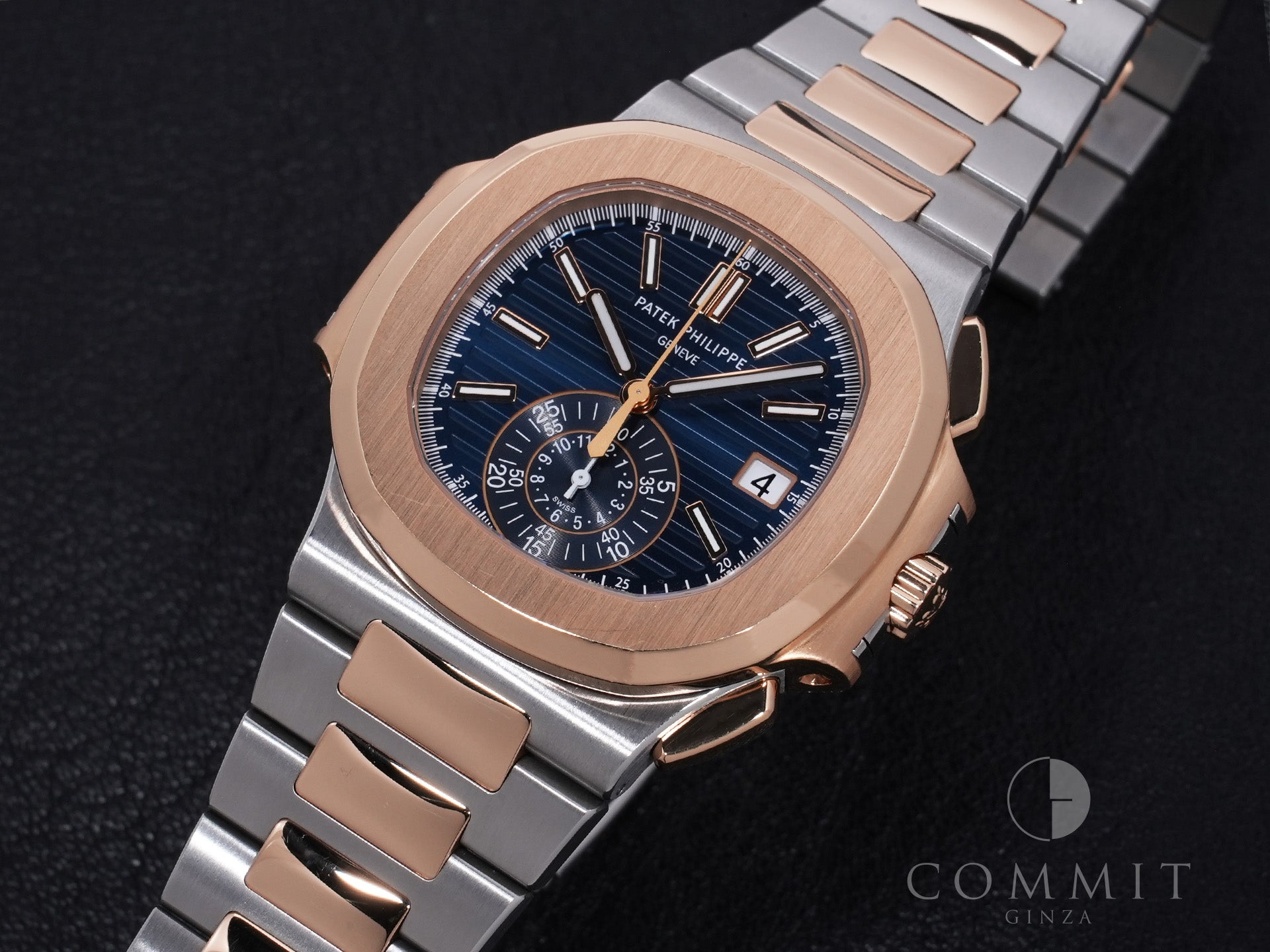Patek Philippe Nautilus Chronograph Ref. 5980/1AR-001 SS/RG Blue Dial, Pre-owned, Excellent Condition  (67aqopet likely refers to an internal reference number or ID and is not translated)