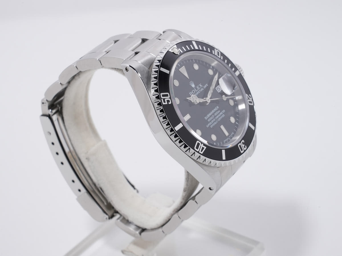 Rolex Submariner Date Ref. 16610 SS Black Dial, Pre-owned (mv7jq5se is likely an internal reference number and not translated)