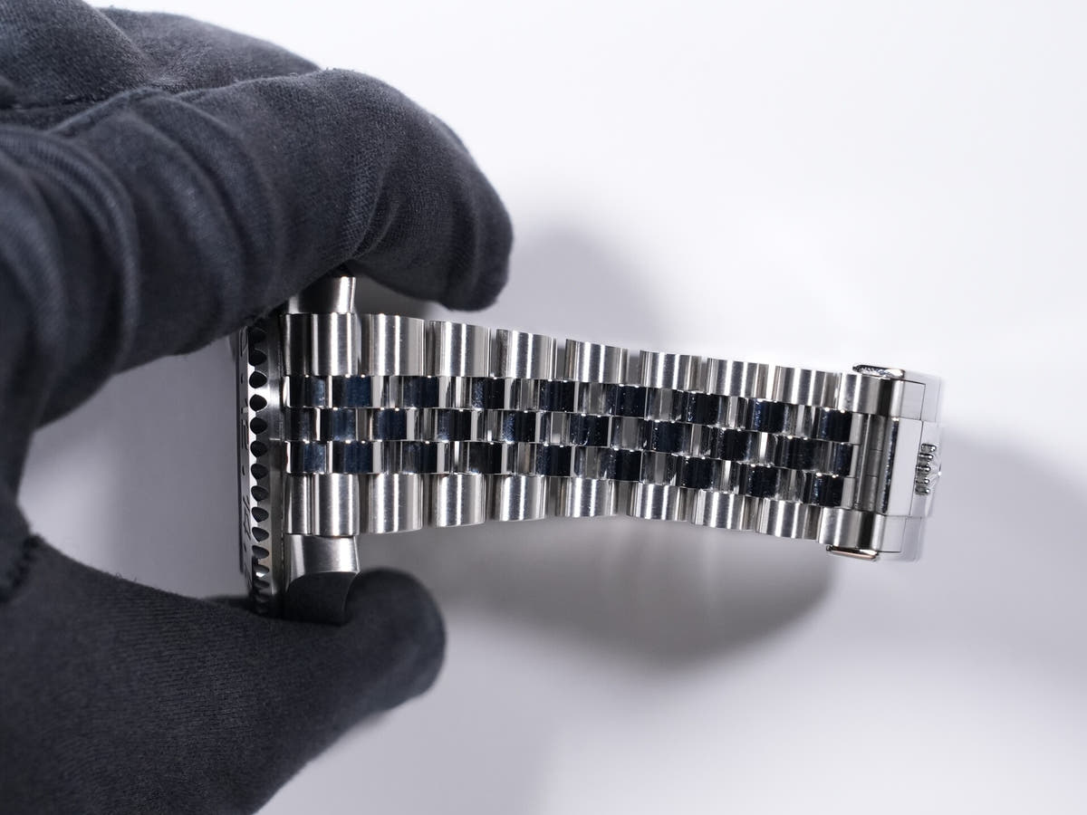 Rolex GMT-Master II Ref. 126710GRNR, stainless steel, black dial, Jubilee bracelet, pre-owned.  (ck7r6p4n appears to be an internal reference number and not part of the product description)