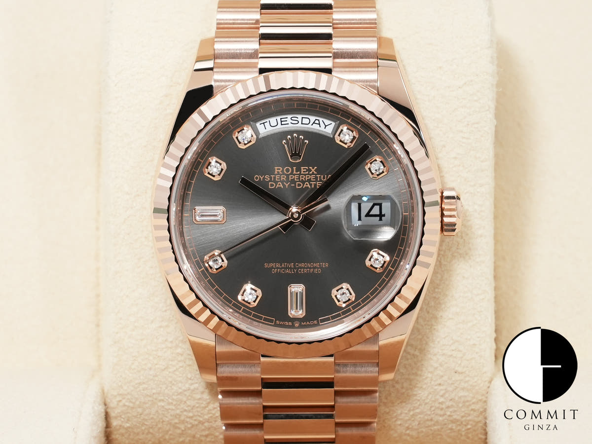 Rolex Day-Date 36 Ref. 128235 Everose Gold Slate Dial with 10 Diamond Hour Markers, Pre-owned, Excellent Condition.  (66kk6ak3 appears to be an internal reference number and is not translated)