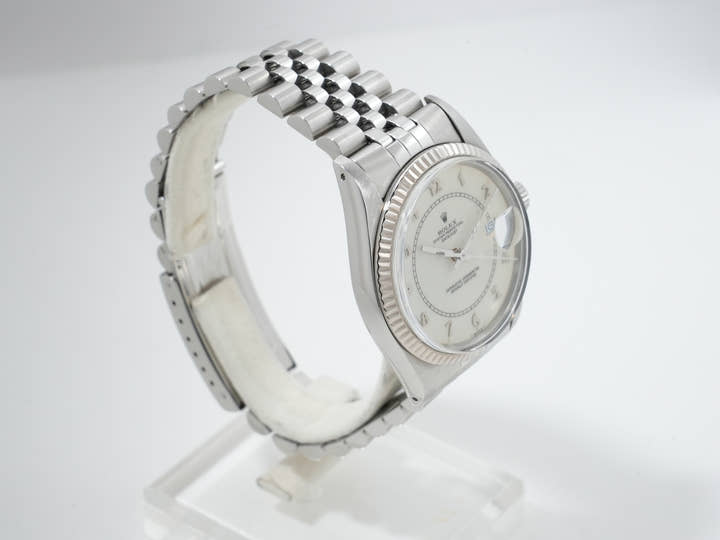 Pre-owned Rolex Datejust Ref. 16014, stainless steel/white gold, boiler gauge dial, Jubilee bracelet.  (6evzeokt appears to be an internal reference number and not part of the product description)