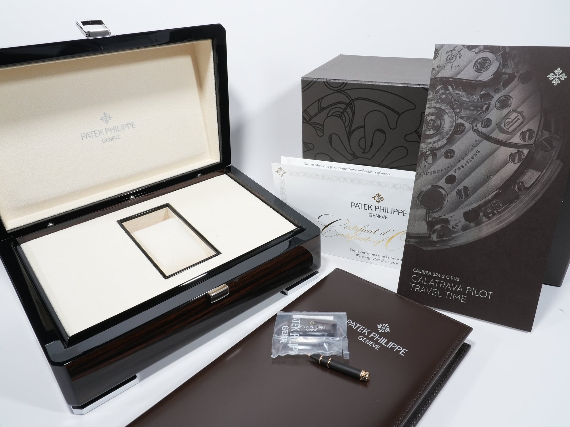 パテックフィリップ カラトラバ パイロット トラベルタイム Ref.7234R-001 ローズゴールド ブラウン文字盤 美中古 v46geafb