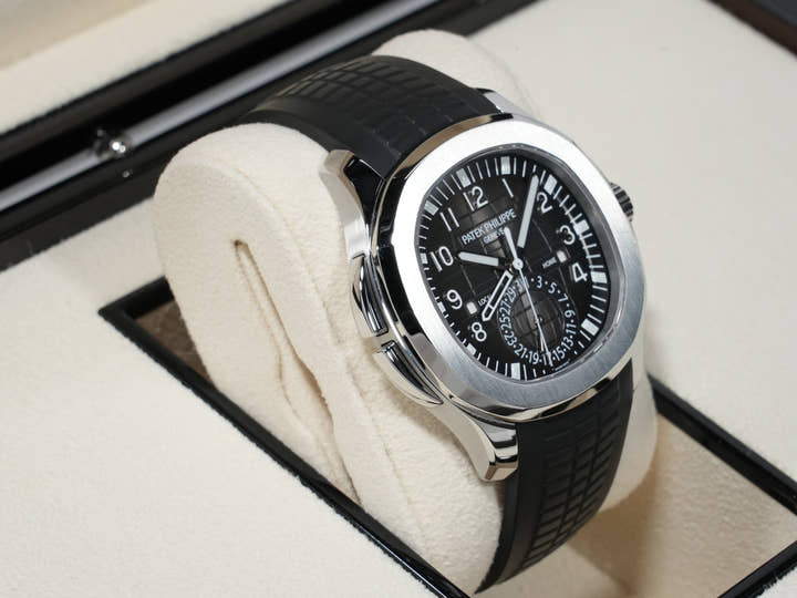 パテックフィリップ アクアノート トラベルタイム Ref.5164A-001 ステンレススチール ブラック文字盤 中古 gfiuodyr