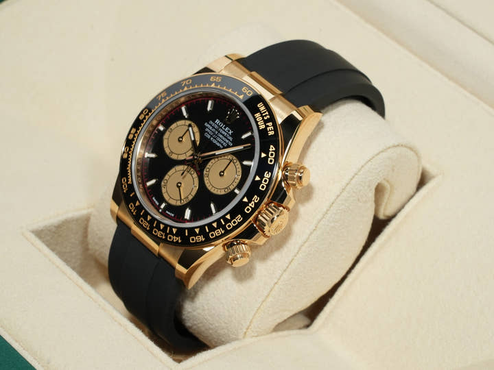 Rolex Daytona Ref. 126518LN Yellow Gold Black and Champagne Dial Unused 4g9r39i9