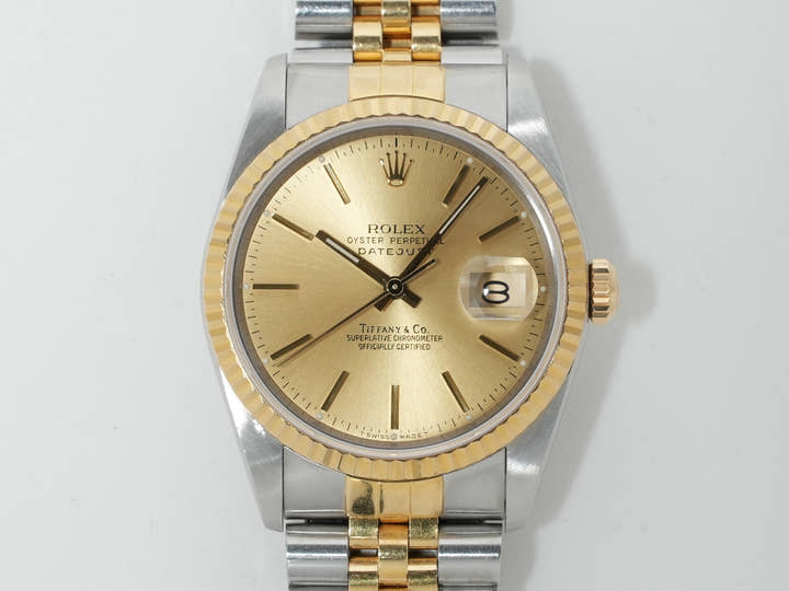 Pre-owned Rolex Datejust 36 with TIFFANY double name, Ref. 16233, stainless steel/yellow gold, champagne dial, ezoq67dh