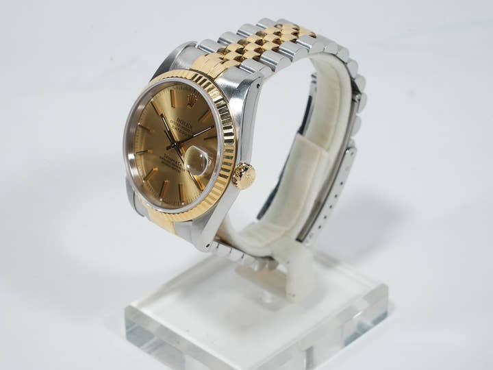 Pre-owned Rolex Datejust 36 with TIFFANY double name, Ref. 16233, stainless steel/yellow gold, champagne dial, ezoq67dh