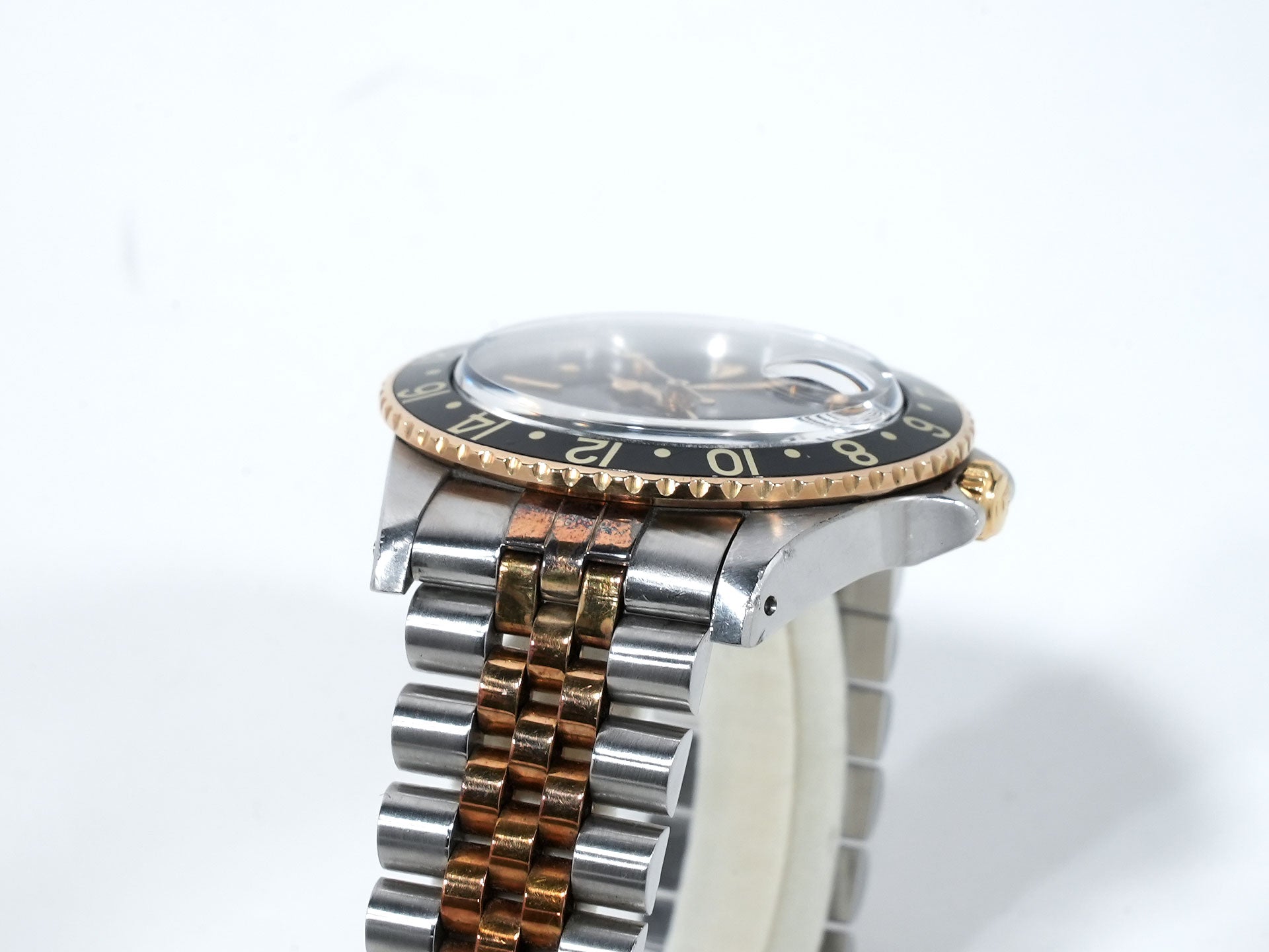 Pre-owned Rolex GMT-Master Ref. 16753 in stainless steel/yellow gold with a black dial and Jubilee bracelet (xkrpyj86)