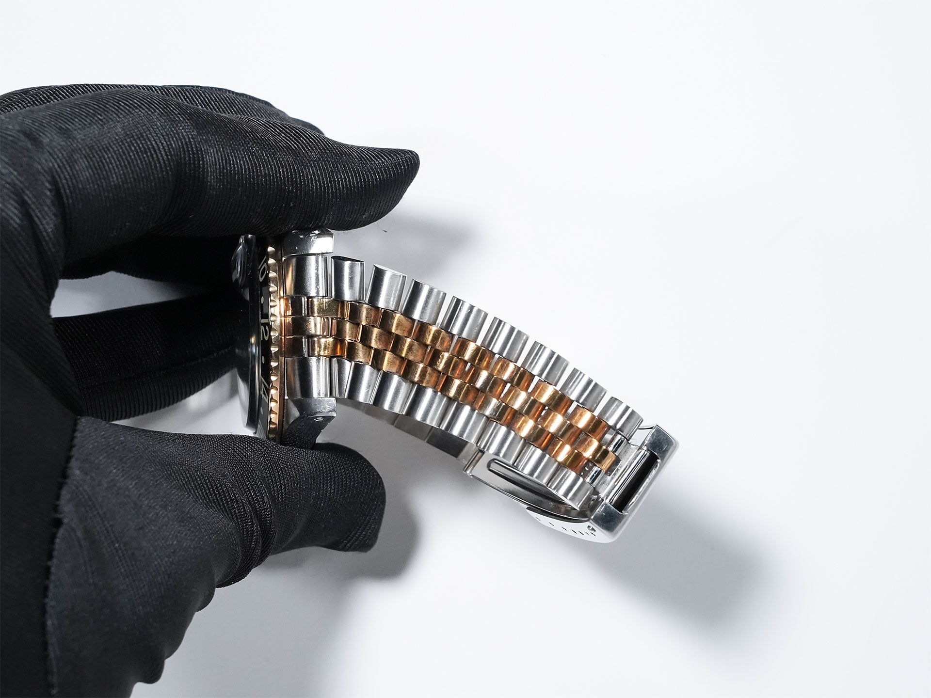 Pre-owned Rolex GMT-Master Ref. 16753 in stainless steel/yellow gold with a black dial and Jubilee bracelet (xkrpyj86)