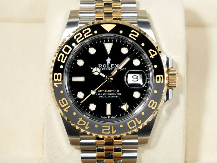 Pre-owned Rolex GMT-Master II Ref. 126713GRNR in stainless steel/yellow gold with a black dial and Jubilee bracelet (9ahj2noe)