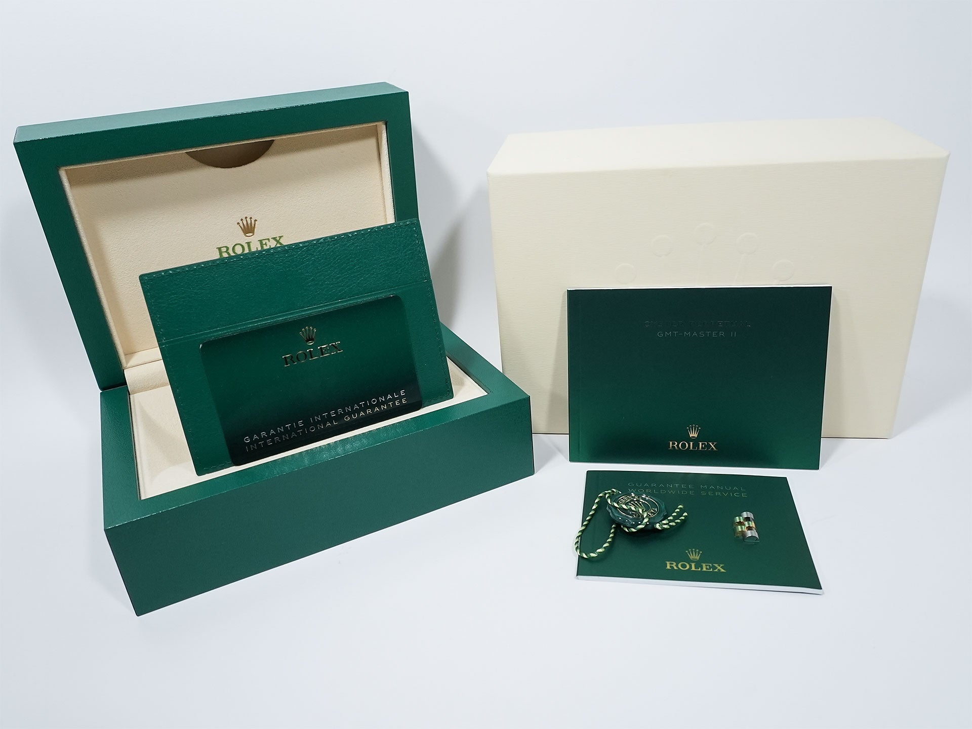 Pre-owned Rolex GMT-Master II Ref. 126713GRNR in stainless steel/yellow gold with a black dial and Jubilee bracelet (9ahj2noe)