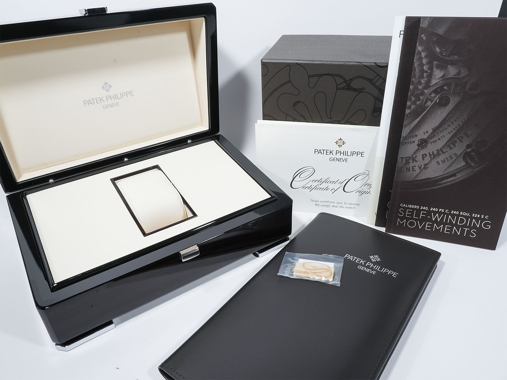 パテックフィリップ カラトラバ Ref.5088P-001 プラチナ 手彫金を施した黒七宝文字盤 美中古 q7ye4ob7