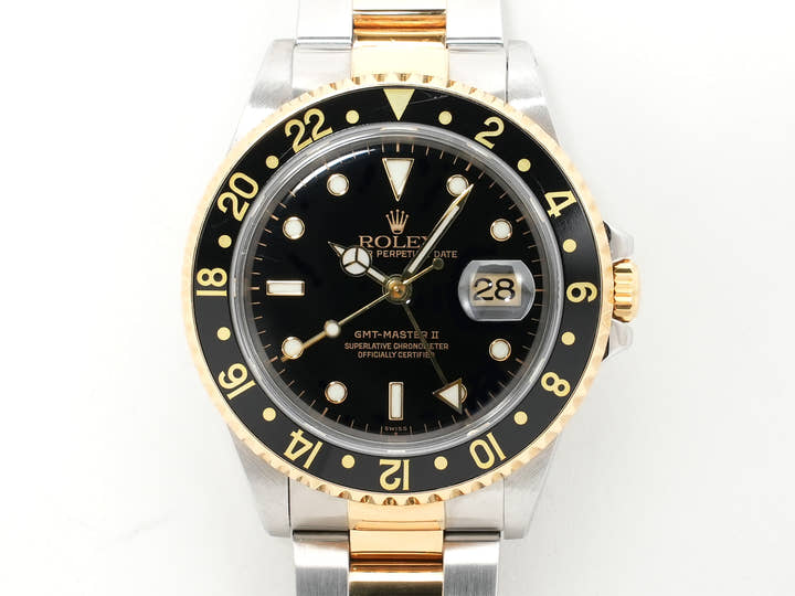 Pre-owned Rolex GMT-Master II Ref. 16713 in stainless steel/yellow gold with a black dial and Oyster bracelet (anvkf7ce)