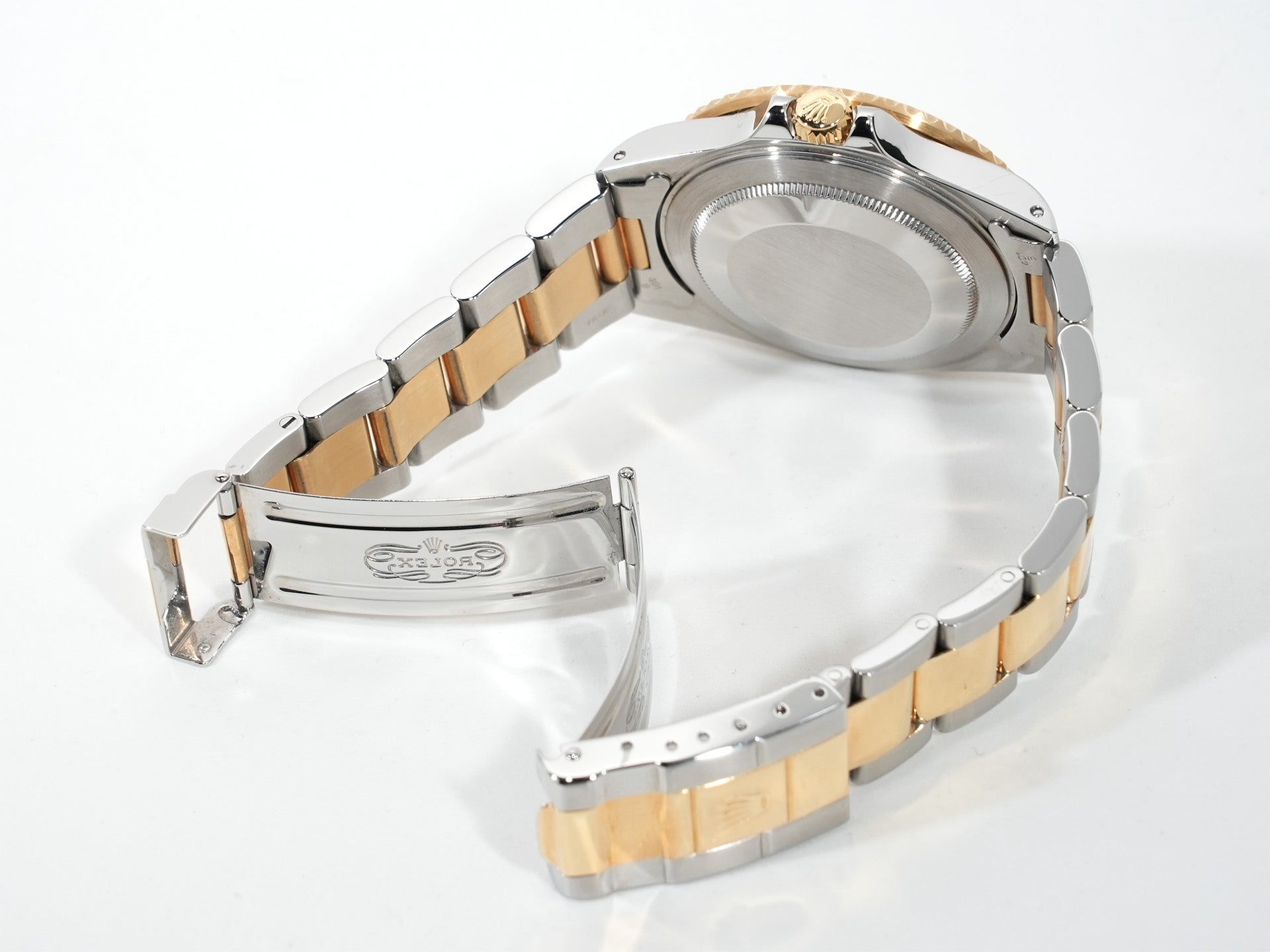 Pre-owned Rolex GMT-Master II Ref. 16713 in stainless steel/yellow gold with a black dial and Oyster bracelet (anvkf7ce)