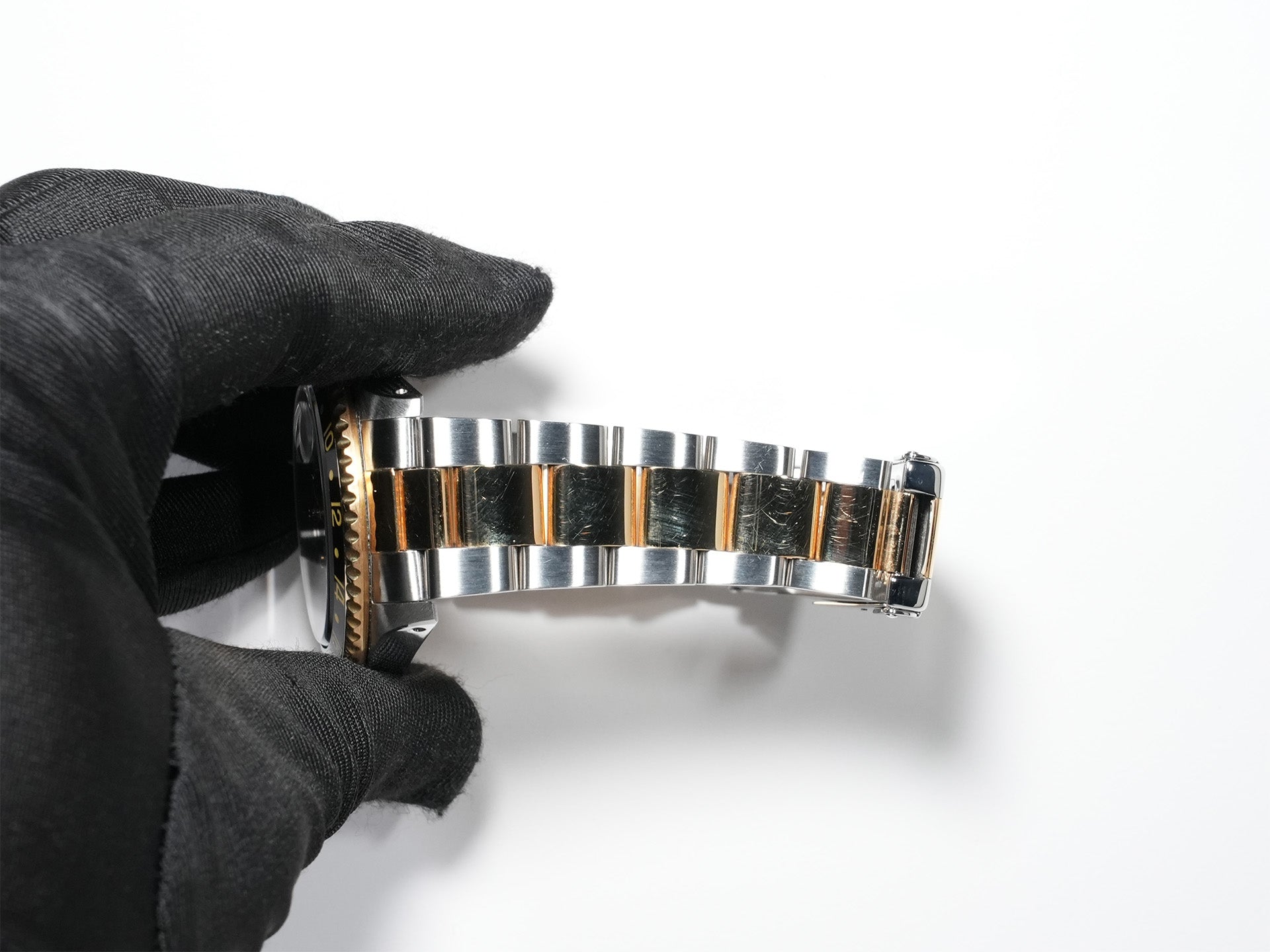 Pre-owned Rolex GMT-Master II Ref. 16713 in stainless steel/yellow gold with a black dial and Oyster bracelet (anvkf7ce)