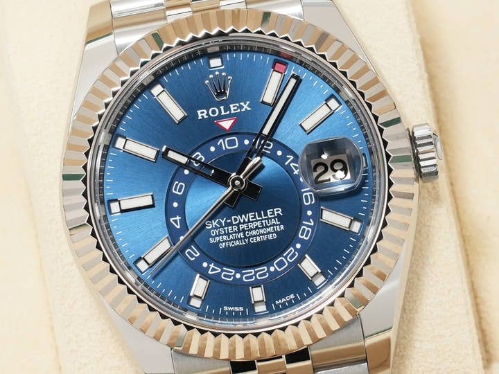 Pre-owned Rolex Sky-Dweller Ref. 326934 in stainless steel/white gold with a blue dial and Jubilee bracelet.