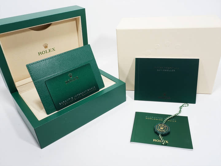 Pre-owned Rolex Sky-Dweller Ref. 326934 in stainless steel/white gold with a blue dial and Jubilee bracelet.