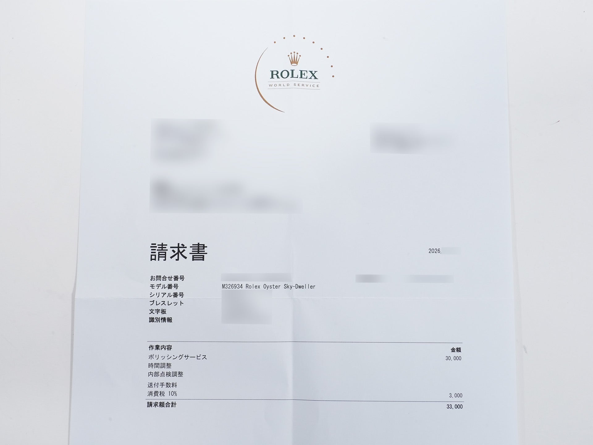 Pre-owned Rolex Sky-Dweller Ref. 326934 in stainless steel/white gold with a blue dial and Jubilee bracelet.