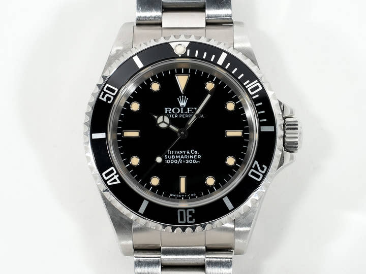 ロレックス サブマリーナー ノンデイト ティファニー Ref.14060 ステンレススチール ブラック文字盤 中古 iafyu6i2