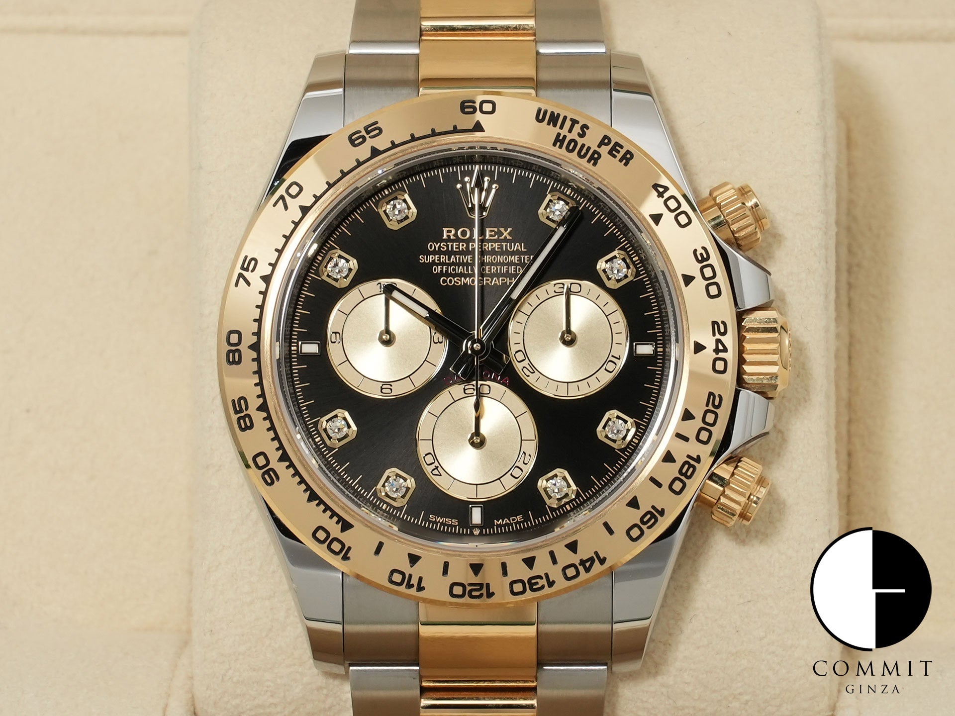 Pre-owned Rolex Daytona Ref. 126503G in stainless steel/yellow gold with a black and golden 8-diamond dial.