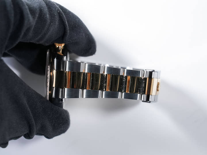 Pre-owned Rolex Daytona Ref. 116503NG Stainless Steel/Yellow Gold with Black Shell Dial (hvxa96pa)