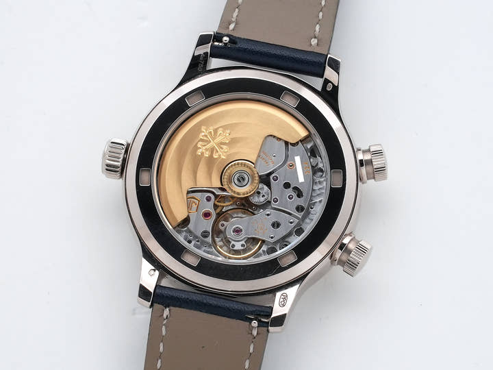 Patek Philippe Calatrava Pilot Travel Time Ref. 7234G-001 White Gold Blue Dial Excellent Used Condition ndfbsbq3