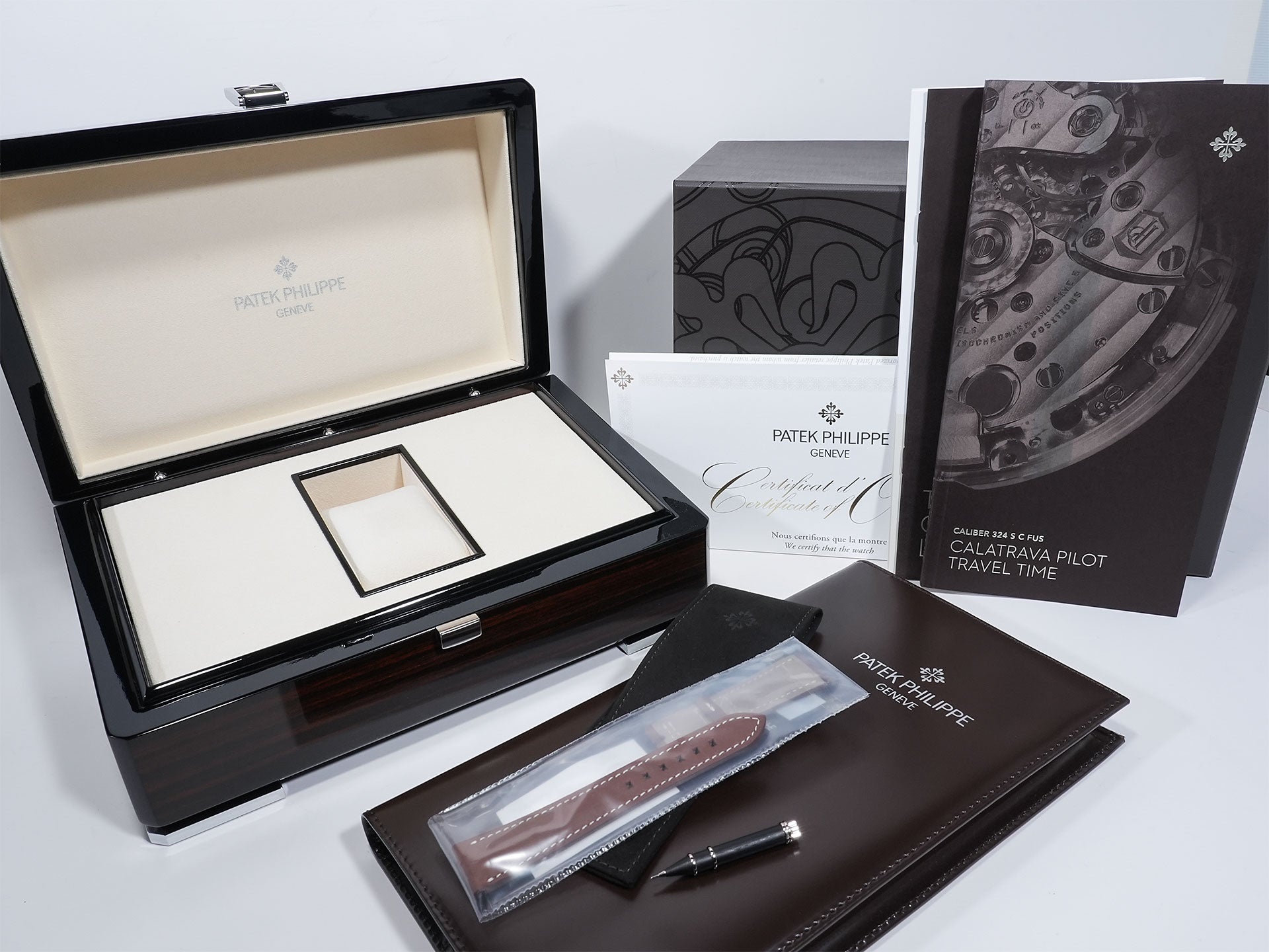 Patek Philippe Calatrava Pilot Travel Time Ref. 7234G-001 White Gold Blue Dial Excellent Used Condition ndfbsbq3