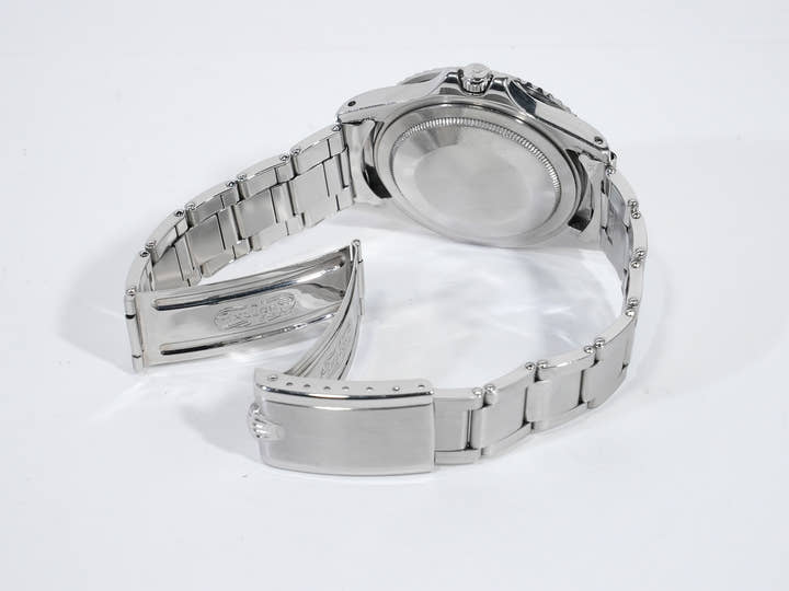 Rolex GMT-Master Ref. 1675 Stainless Steel Black Dial Oyster Bracelet Used 36c384z9