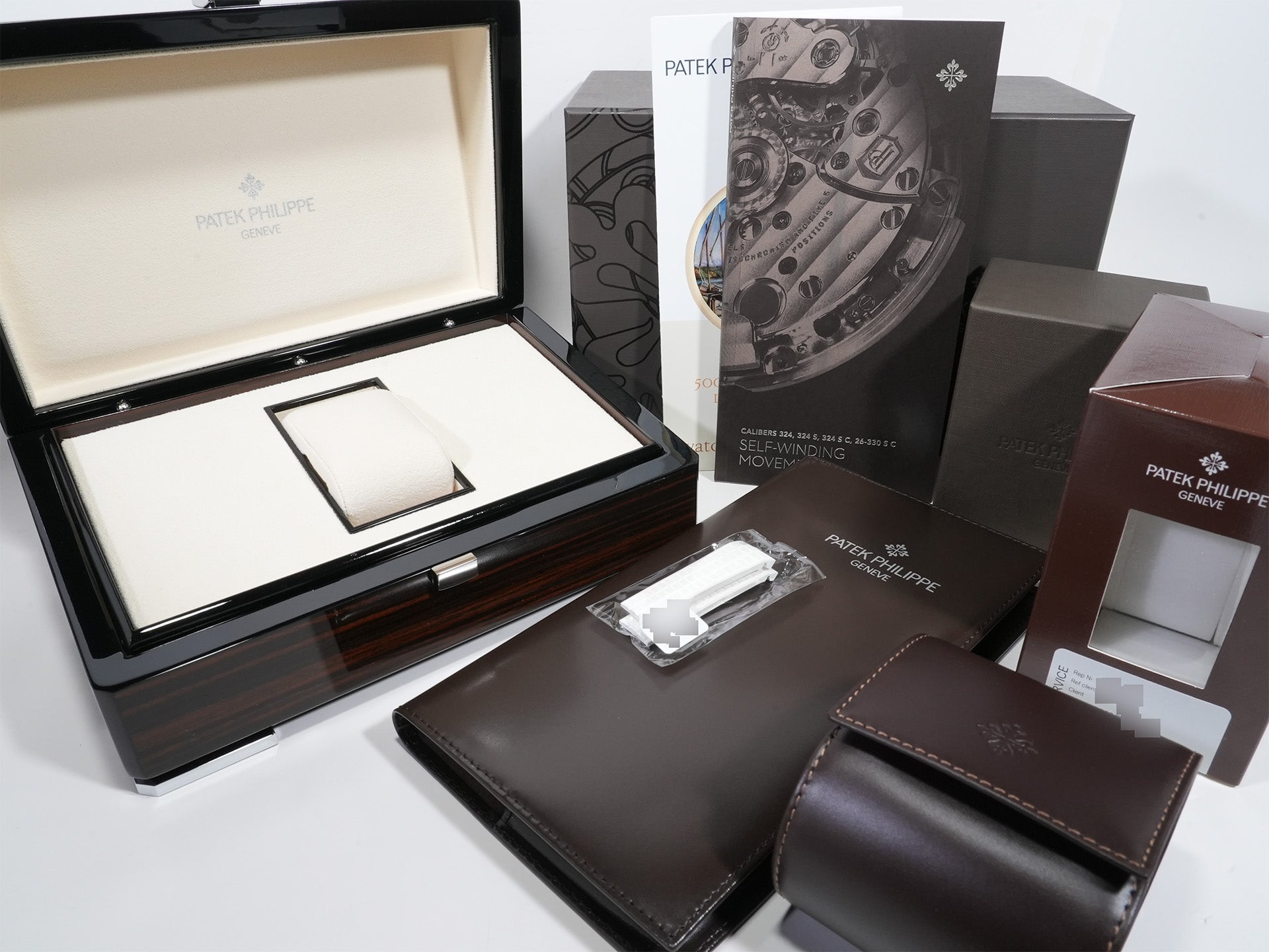 Patek Philippe Aquanaut Ref. 5268/200R-001 Rose Gold White Dial Excellent Condition ib4pfqmv