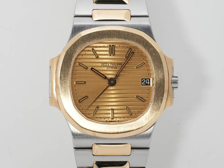 Patek Philippe Nautilus Ref. 3800/1JA Stainless Steel/Yellow Gold Champagne Dial Used c57cxbmq