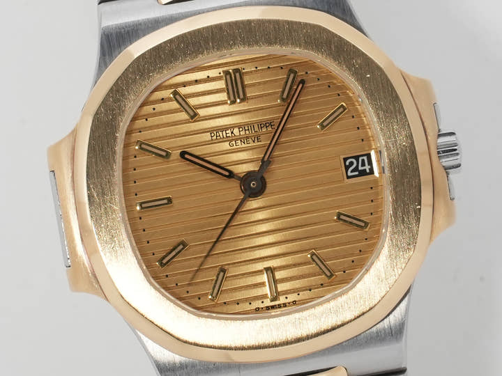Patek Philippe Nautilus Ref. 3800/1JA Stainless Steel/Yellow Gold Champagne Dial Used c57cxbmq